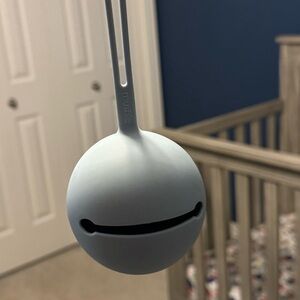 Mushie pacifier holder